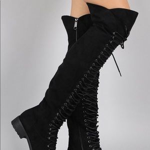 Over the knee lace up boots